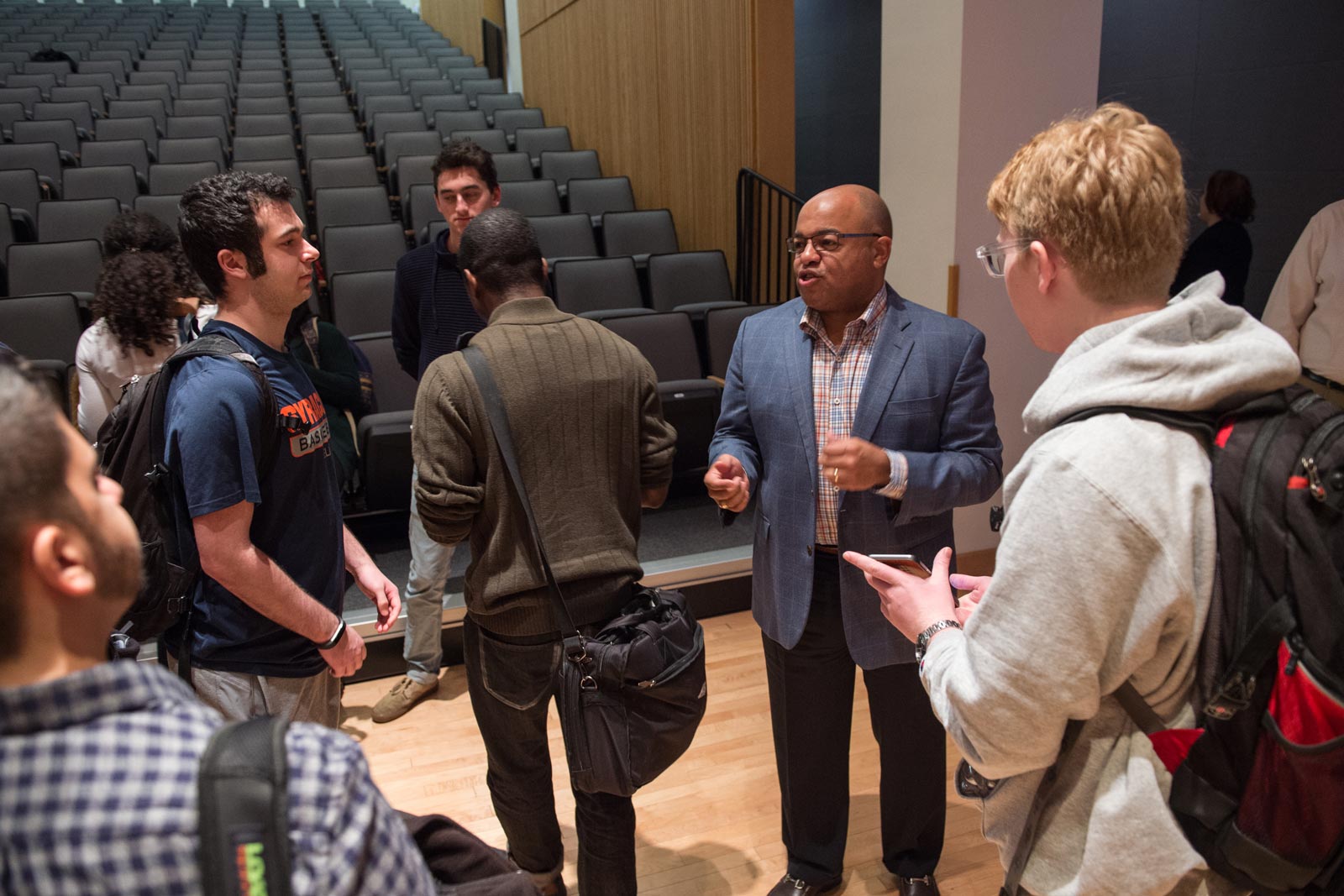 Mike Tirico speaking to students