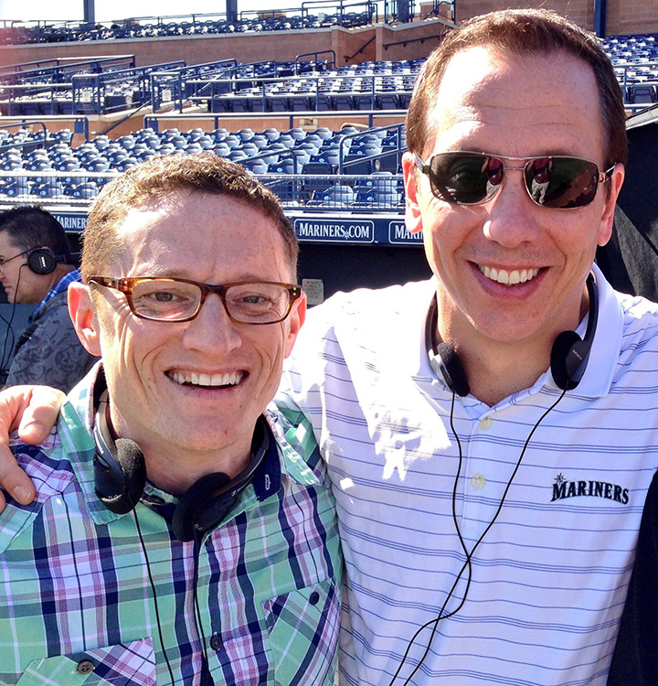 Alumni Gregg Greene and Kevin Martinez work together in the Seattle Mariners marketing department.