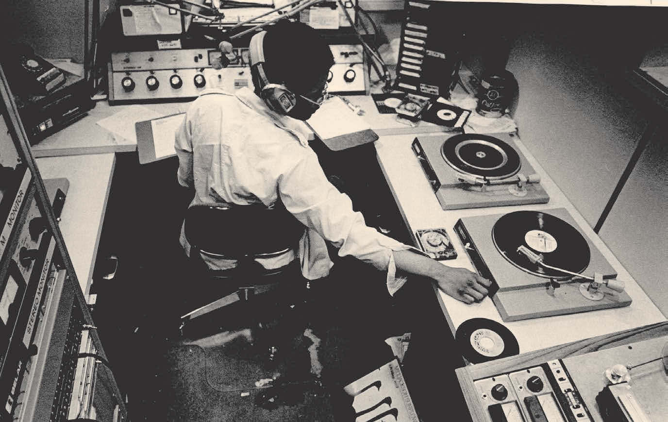 A student in the WAER studio in the 1970s